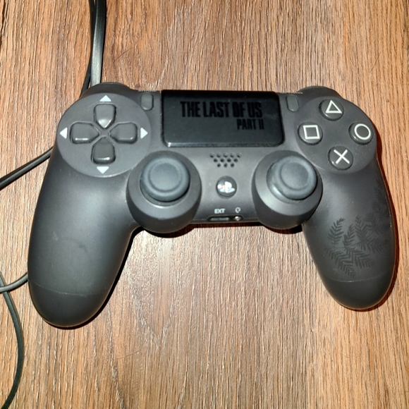 PS4 with Controller/ charger and HDMI cable, 3 PS4 games